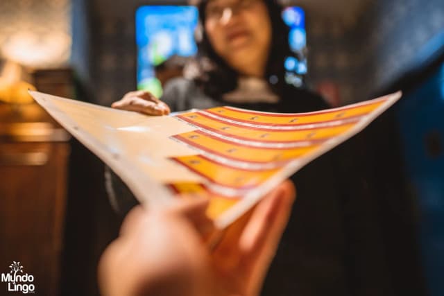 A packed Mundo Lingo event under canopy lights